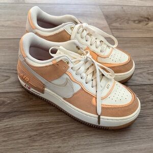 Nike Air Force 1 Low in Cream and Orange